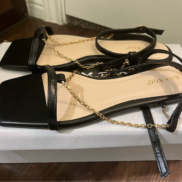 NWT Black and Gold Sandals - Picture 2 of 4